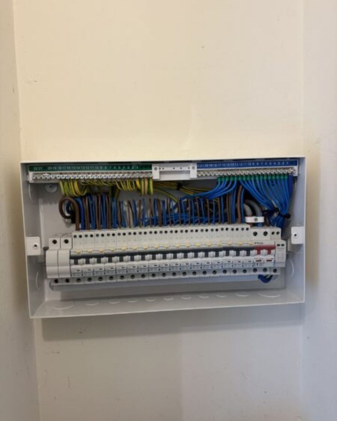 Professional EICR Inspections for Safe & Compliant Properties Certified electrician inspecting a consumer unit as part of an Electrical Installation Condition Report (EICR) for a rental property.